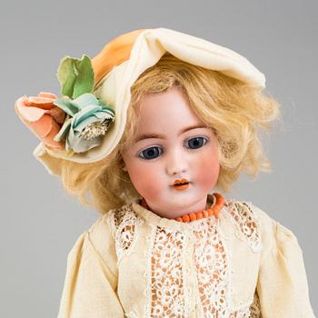 a Franz Schmidt & Co porcellain doll from the early 20th century.