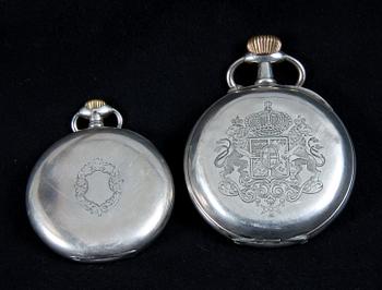 FICKUR, 2 st, låghaltigt silver, "Remontoir Ancre" samt "International Watch Co Schaffahusen". 1900-tal.