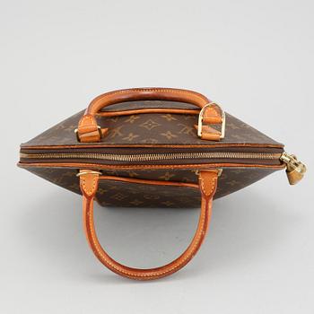 An 'Ellipse' handbag from Louis Vuitton.