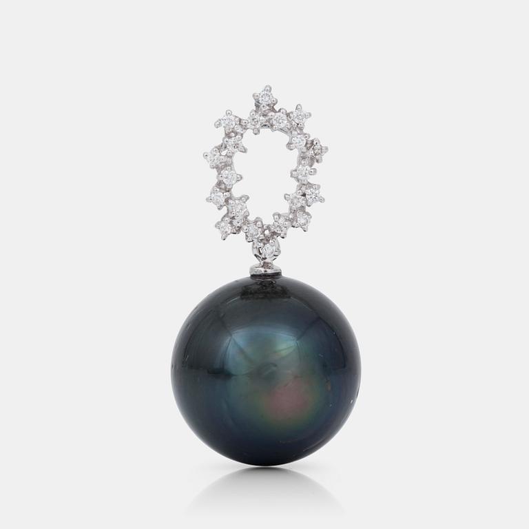 A diamond and cultured Tahiti pearl pendant.