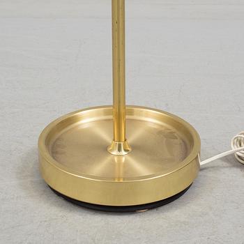 A brass floor lamp by Fagerhult.