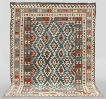 A Kilim carpet, c. 300 x 196 cm.