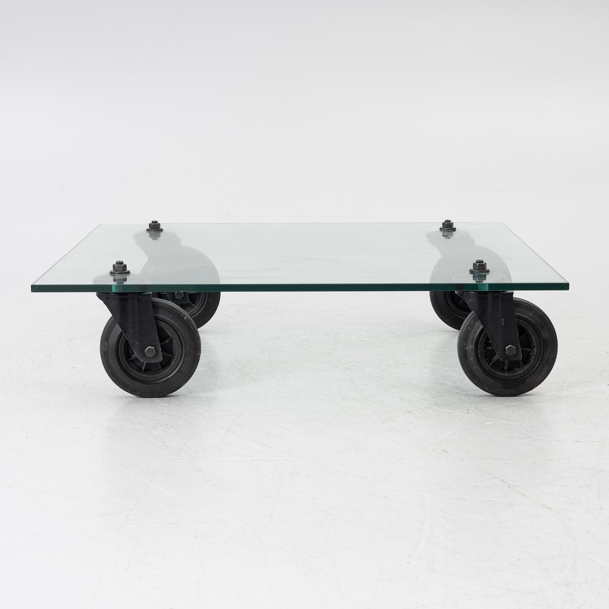 Gae Aulenti, coffee table, “Tavolo con Ruote”, Fontana Arte, Italy, late 20th/early 21st century.