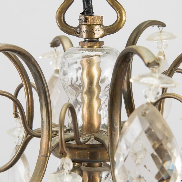 A rococo style chandelier, early 20th century.