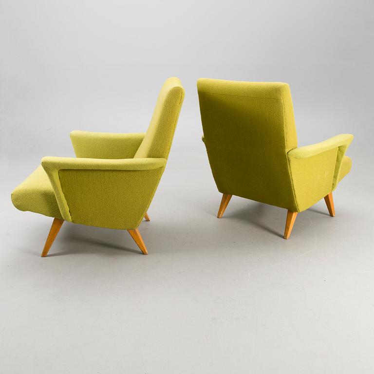 A pair of 1950s "Kolibri" armchairs for Moderno Oy, Finland.