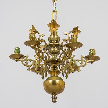 A brass candelabrum, first half of the 20th century.