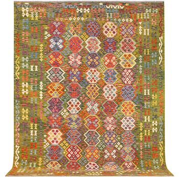 An Afghan Kilim carpet, c. 357 x 266 cm.