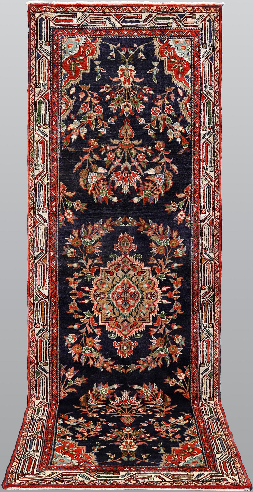 A Hamadan runner, ca 310 x 105 cm.