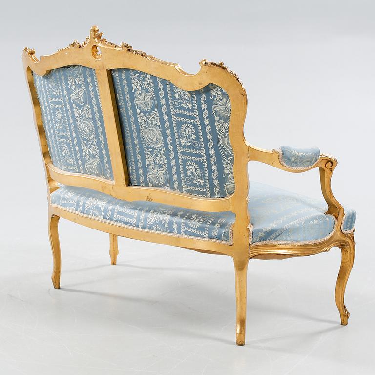 A sofa from the first half of the 20th century.