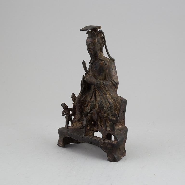 A bronze daoist dignitary with attendants, late Ming dynasty.