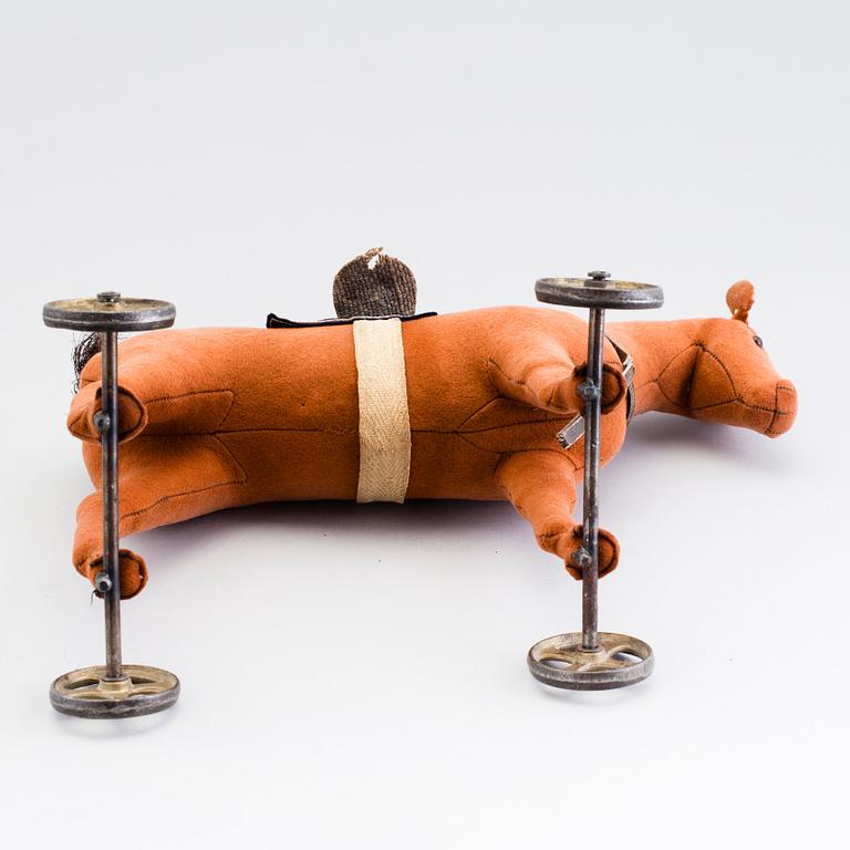 A horse on wheels probably by Steiff 1910.