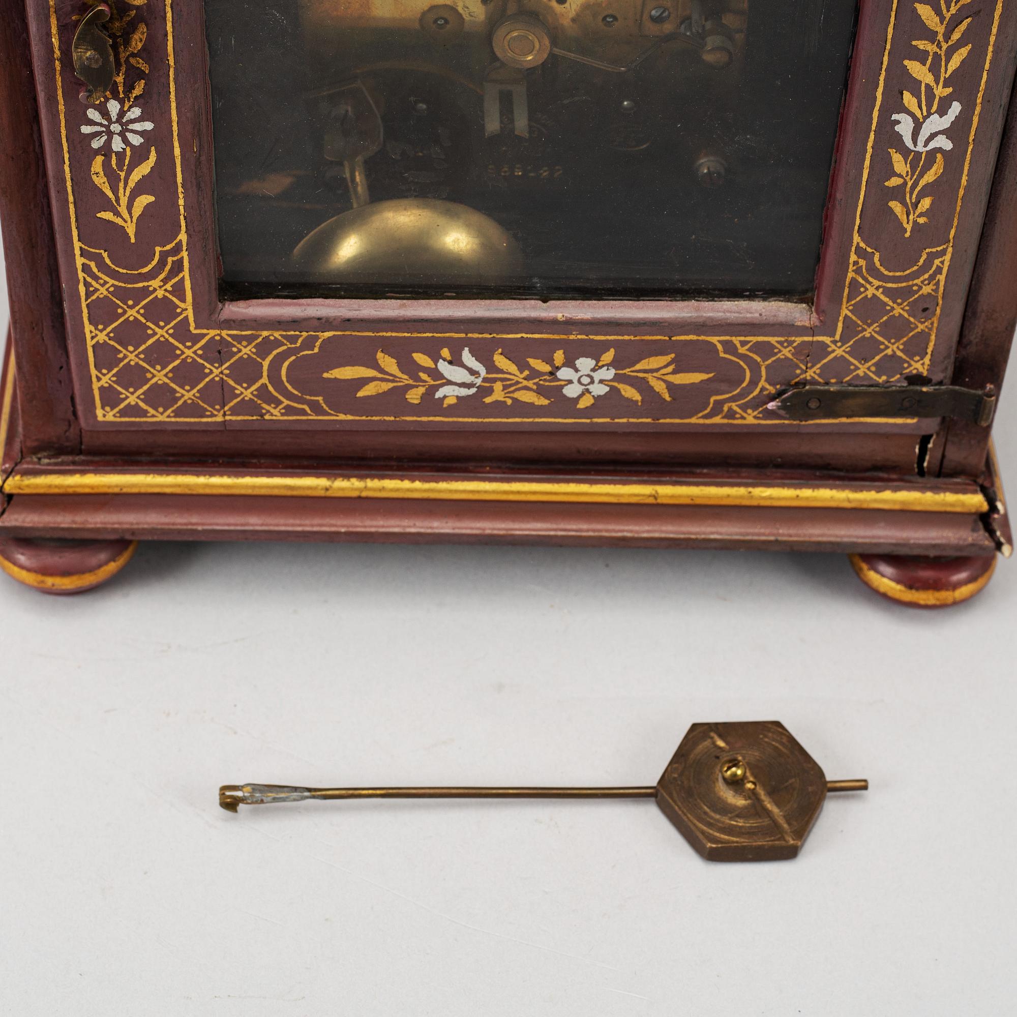 An 18th century table clock.