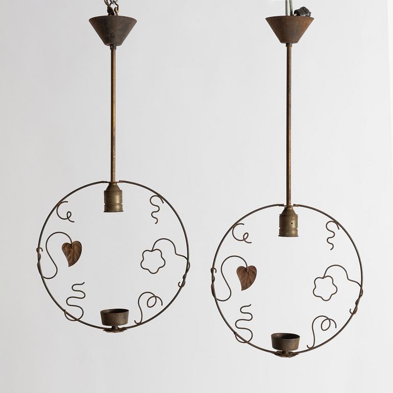 A pair of Swedish Modern ceiling lamps, 1940s.