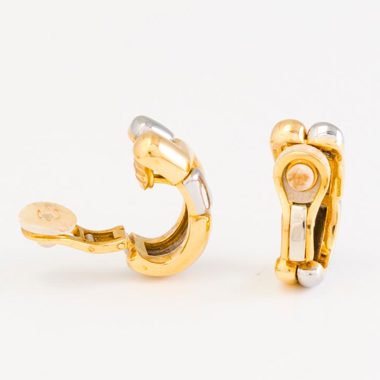 BULGARI, KORVAKORUT, 18K kultaa ja terästä.