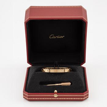 Cartier armband "Love" 18K roséguld med fyra runda briljantslipade diamanter.