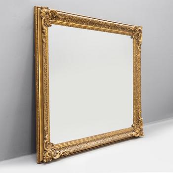 A frame/mirror, around the year 1900.