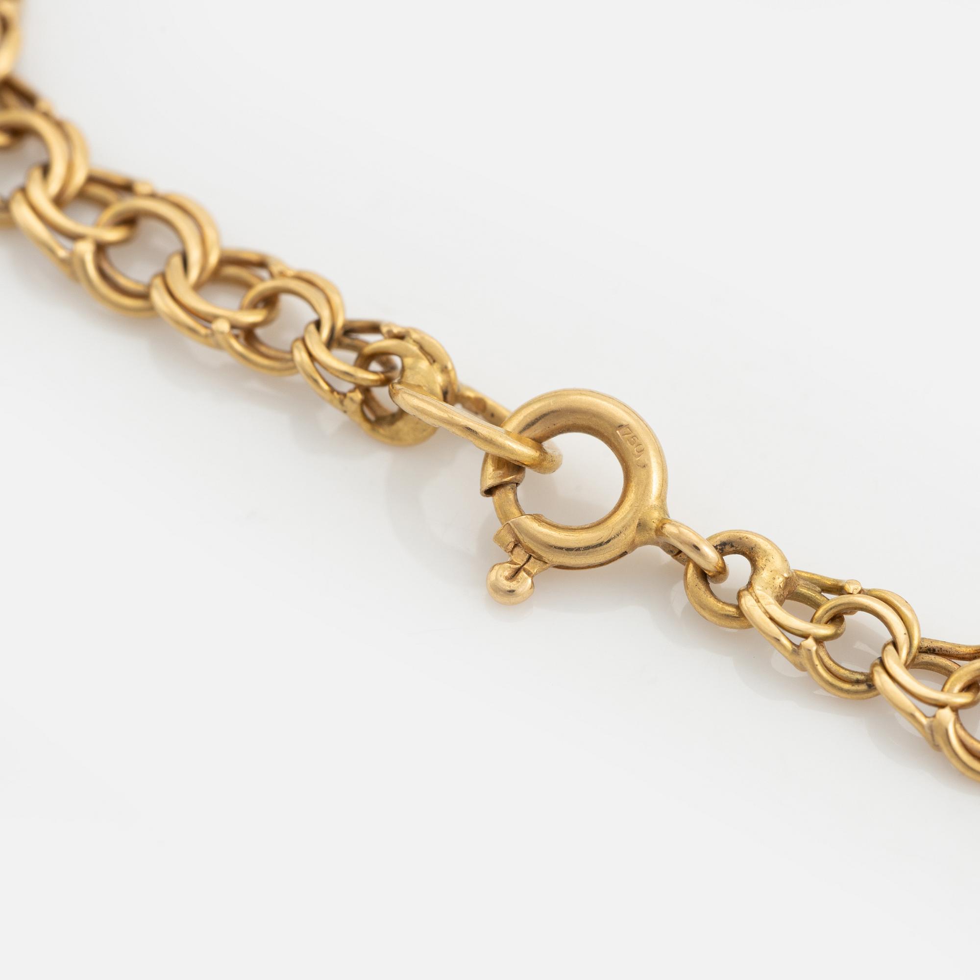 Armlänk, 18K guld, doserad bismarcklänk.