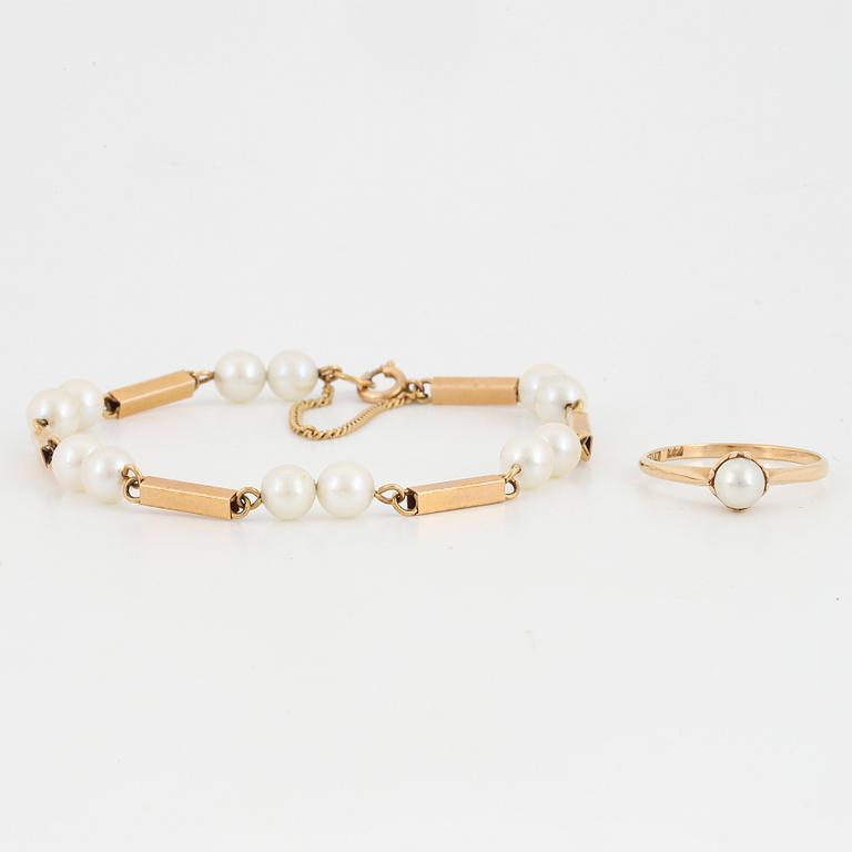 18K gold pearl bracelet and ring.
