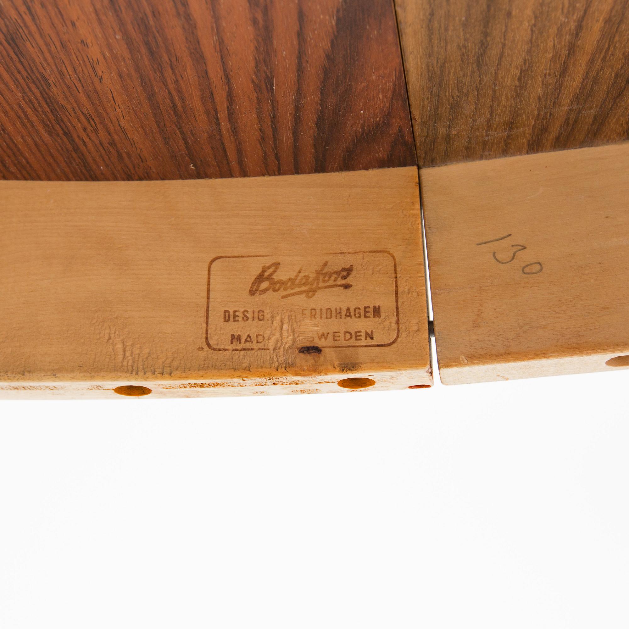 A rosewood dining table by Bertil Fridhagen for Bodafors.