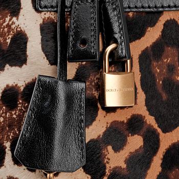 DOLCE & GABBANA, a leopard patterned handbag.