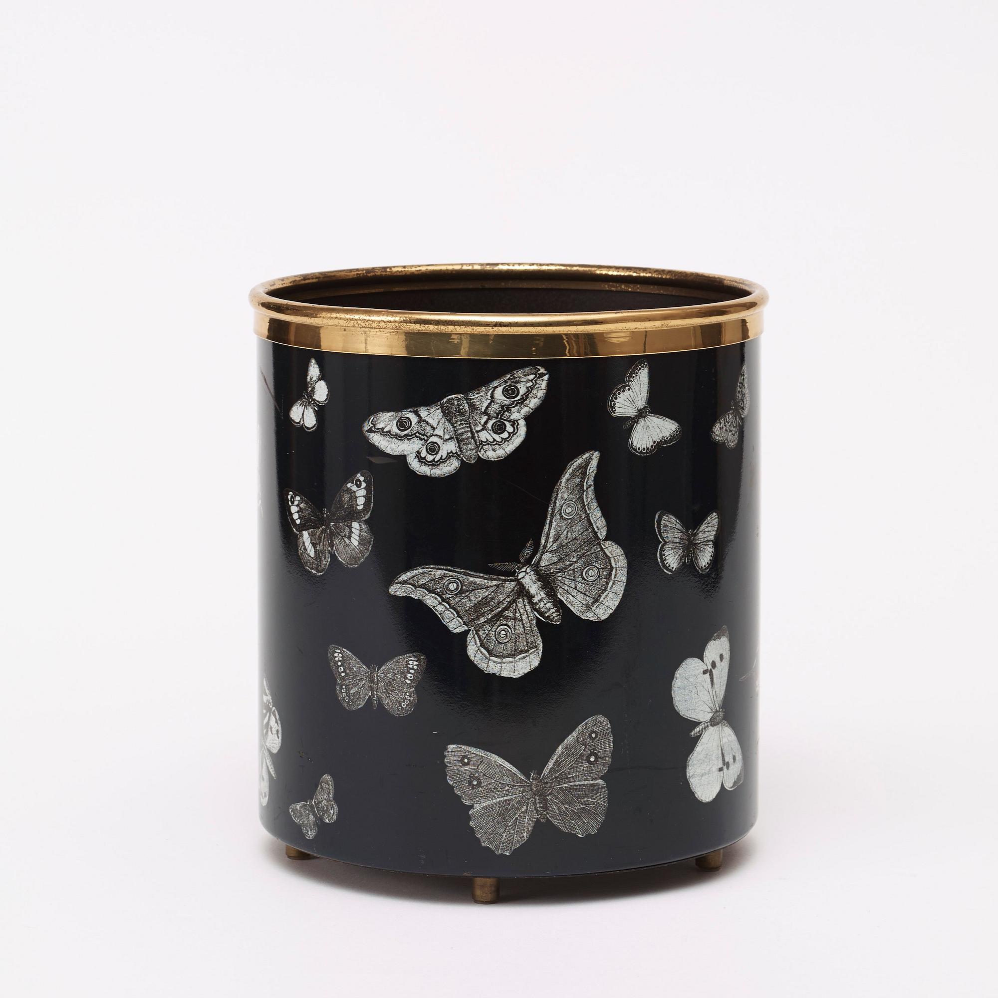 A Piero Fornasetti waste paper bin, Milan, Italy.