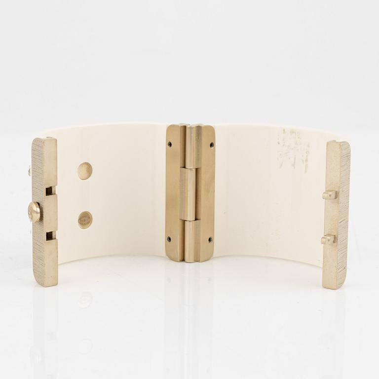 Chanel, a white acrylic bracelet with pearls, 2019.