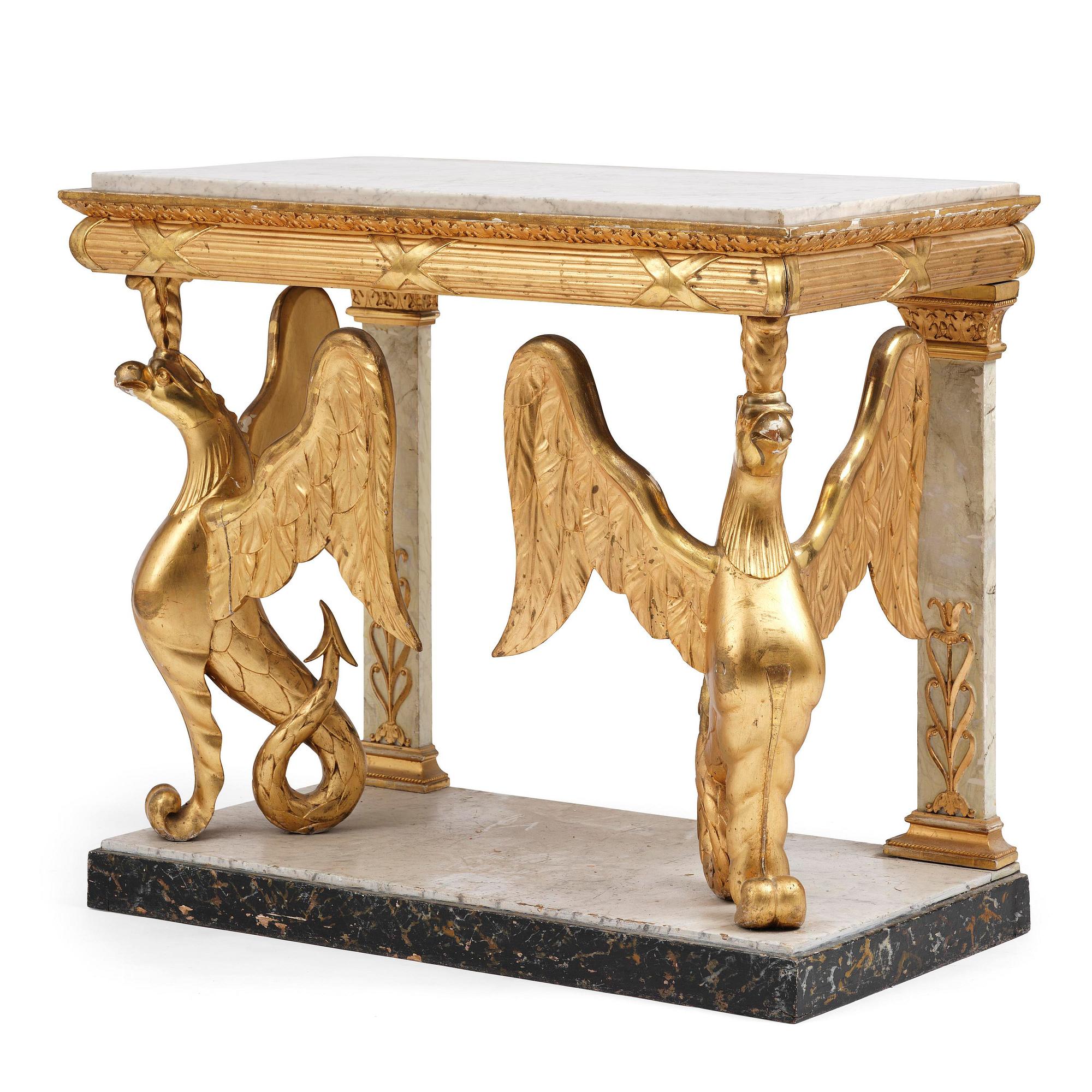 A Swedish Empire gilt wood and white marbel console table.