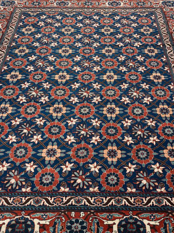 A CARPET, a semi-antique/old Veramin, ca 353 x 213,5-215,5 cm.