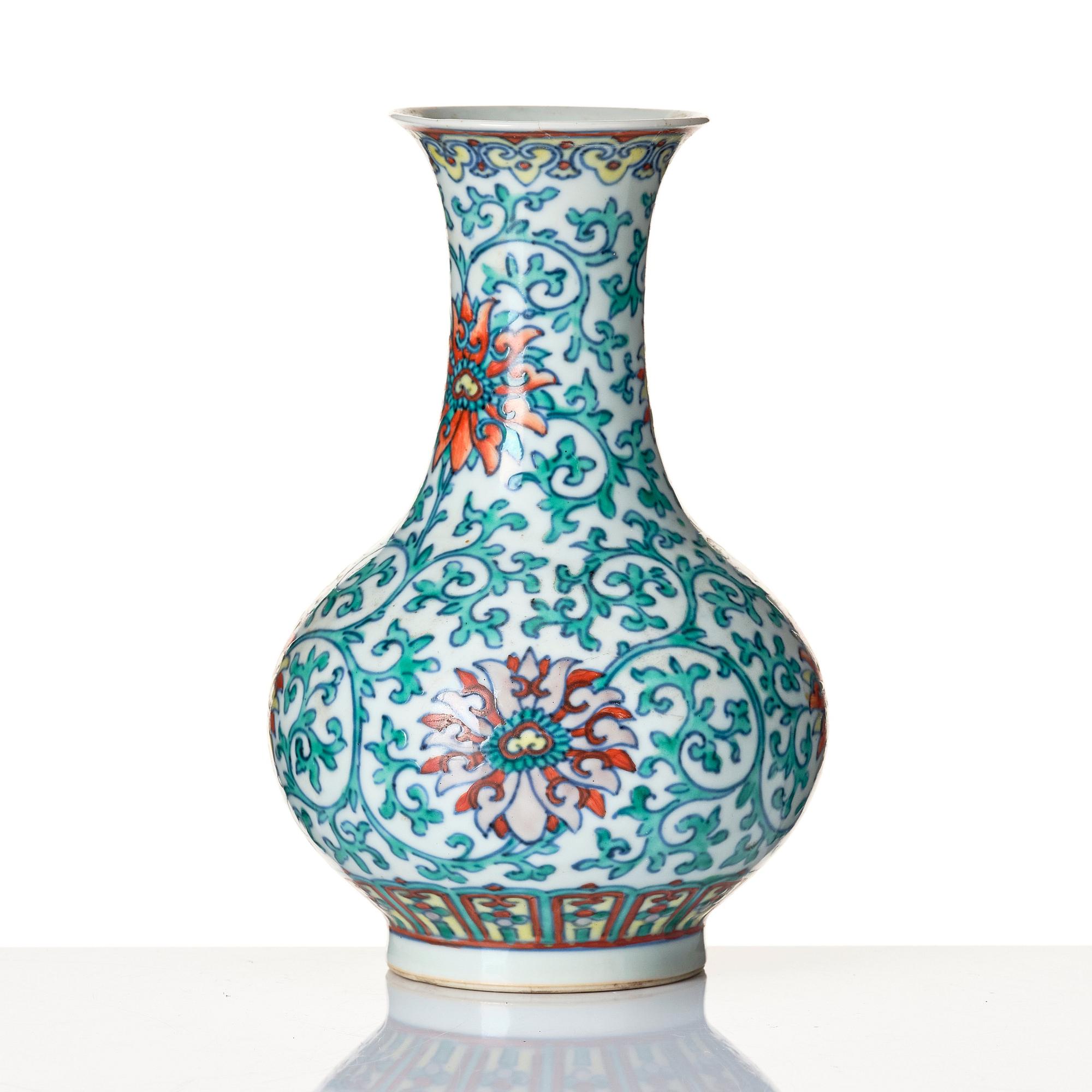 A doucai 'lotus' vase, Qing dynasty with Qianlong seal mark and of the period.