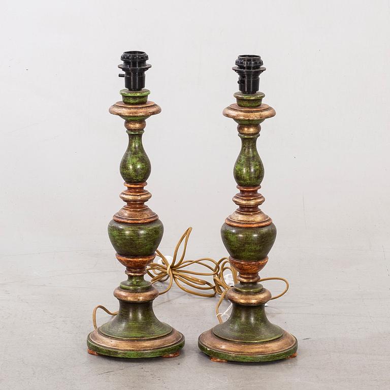 A pair of mid 20th century wood table lamps from Paoletti, Firenze Italy.