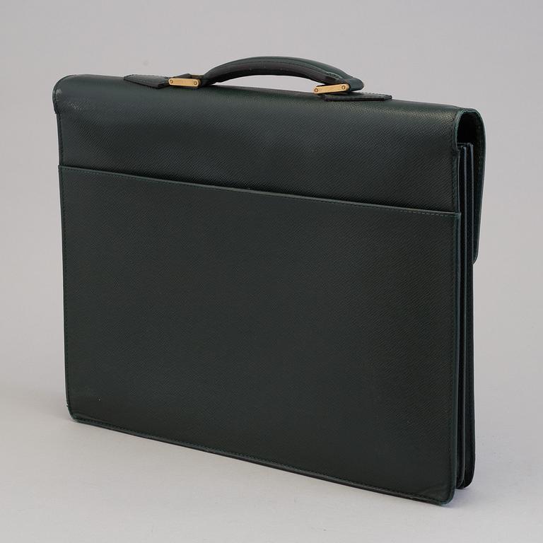 A Louis Vuitton green taiga Ambassador Briefcase.