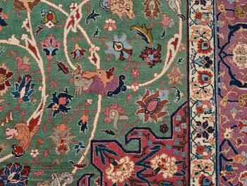 A carpet, a semi-antique Tabriz, ca 374-376,5 x 268-276 cm.