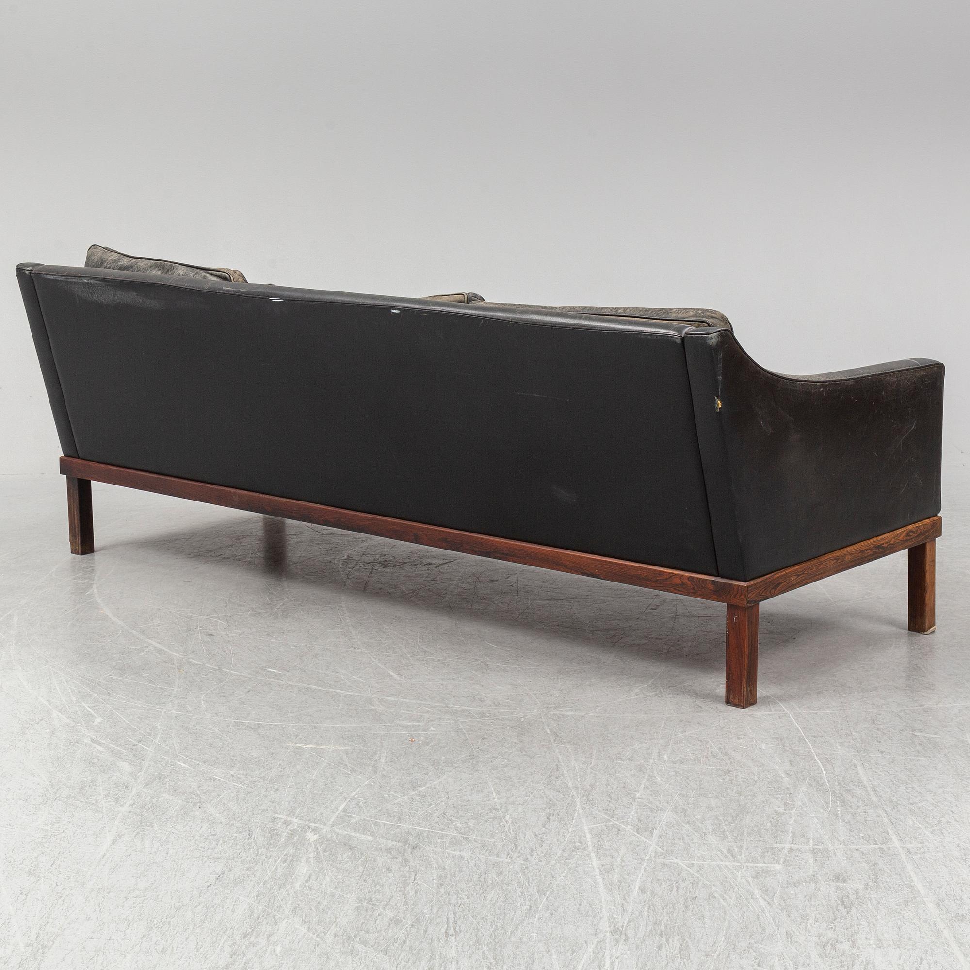 A black leather "The President" sofa by Ingemar Thillmark for OPE-möbler. Sweden.