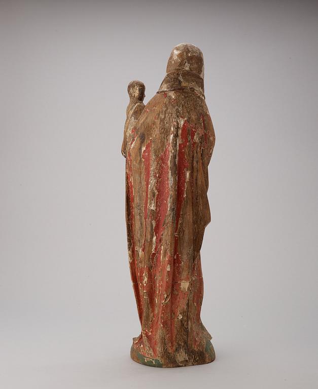 A late Gothic wooden sculpture of Anna selbdritt, presumably 16th century.