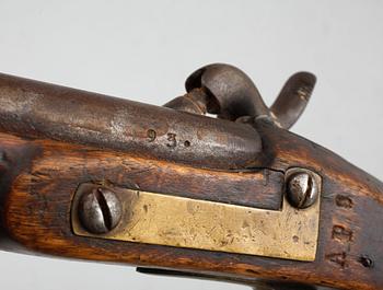 A mid 19th century cap lock gun.