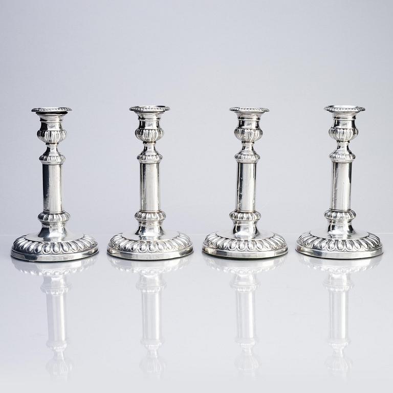 Four English silver candlesticks, marks of John Roberts & Co, Sheffield 1808.