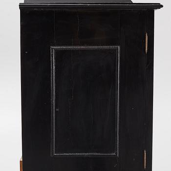 A South-German Baroque ebonized collector's cabinet on stand, circa 1700.