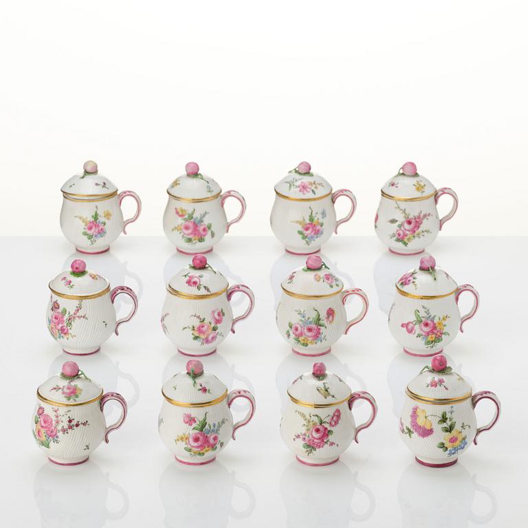 A set of 12 Swedish Marieberg custard cups with covers, 18th century.