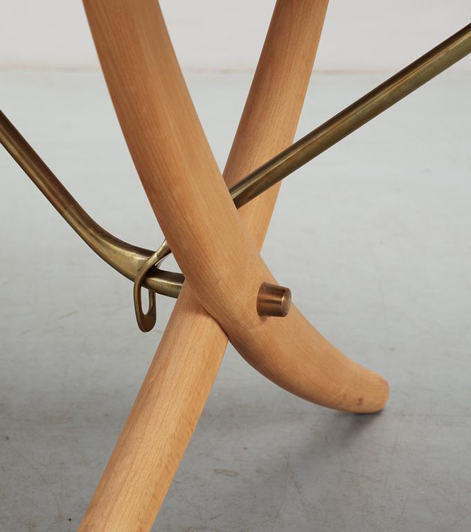 A Hans J Wegner teak and beech dinner table by Andreas Tuck, Denmark.