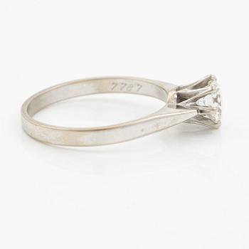 Ring in 18K white gold set with a brilliant-cut diamond weighing 0.84 ct according to the engraving.