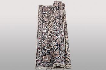 A rug, Nain, part silk, ca 196 x 120 cm.