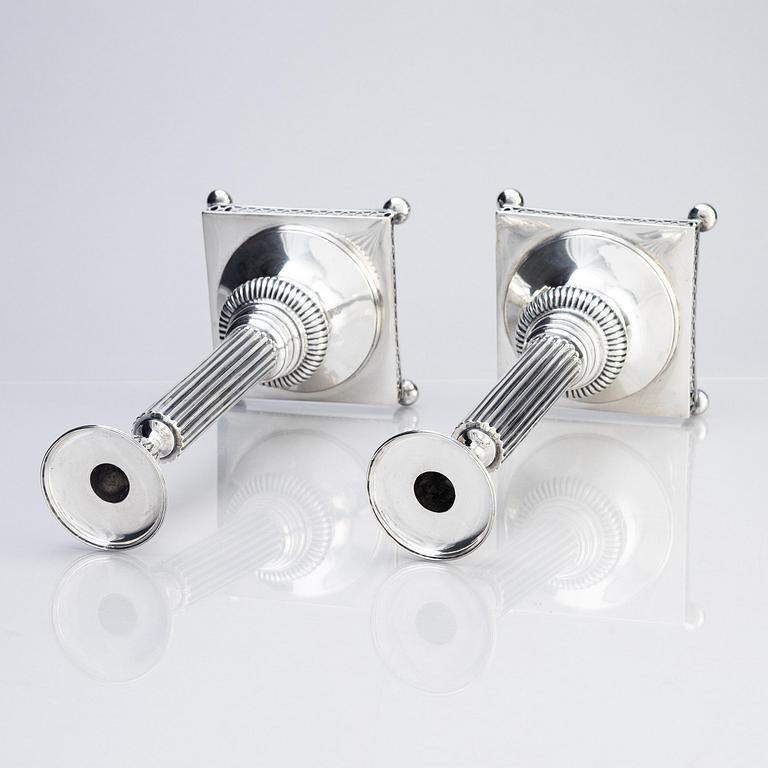 A pair of Swedish 18th century Gustavian silver candlesticks, mark of Arvid Floberg, Stockholm 1798.