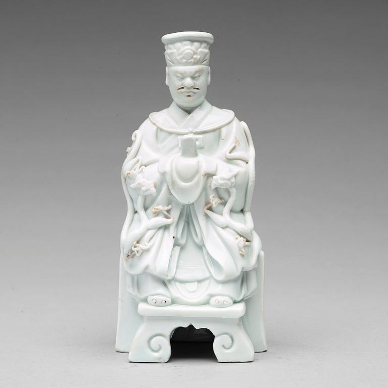 A blanc de chine figure of a daoist dignitary, Qing dynasty.