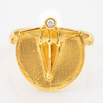 Ring, 18K guld med en rund briljantslipad diamant.