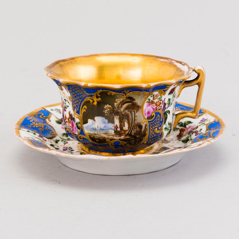 A Popov porcelain cup with saucer, Russia mid-19th Century.