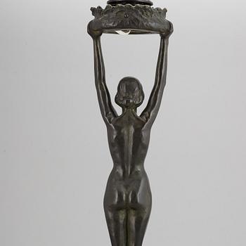 GERDA SPRINCHORN, an Art Nouveau green patinated bronze lamp "The Sun", Herman Bergman, Stockholm, early 20th century.