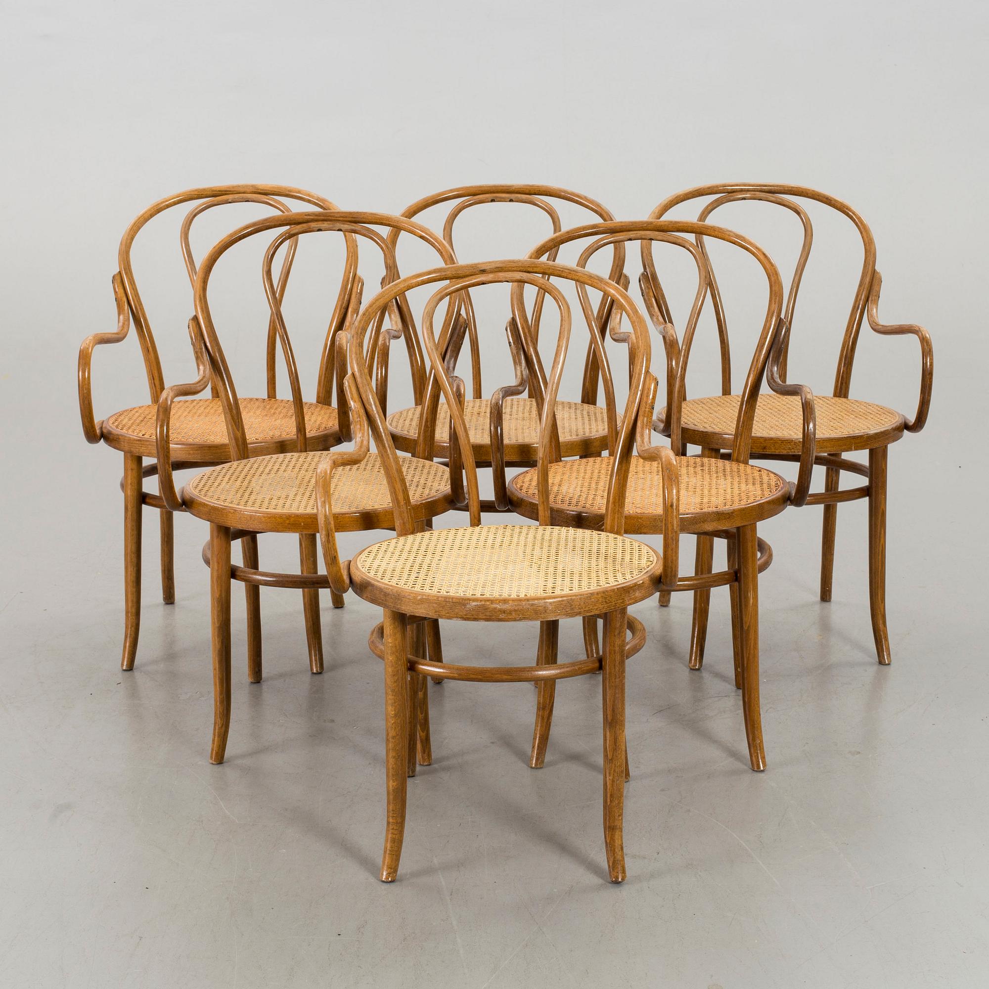 A SET OF 6 BENTWOOD ARMCHAIRS.