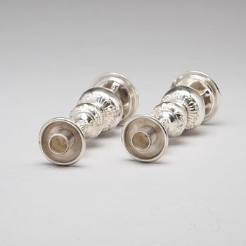 A pair of Chinese silver candle sticks, Shanghai, early 20th Century.
