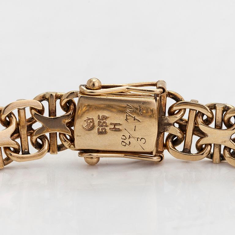 A 14k gold bracelet, x-link. Finnish import marks 1971.