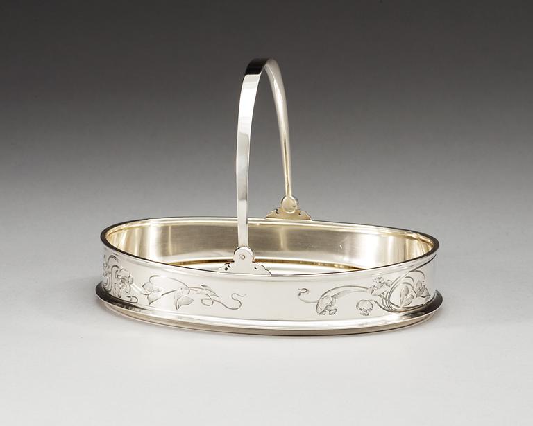 A Russian 19th century silver basket, makers mark of Oreste Kurlukov, Moskva 1896-1908.